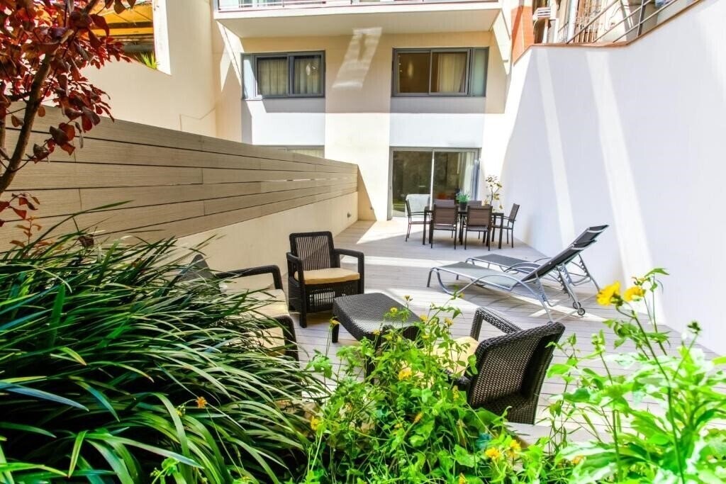 Фотографія Cosmo Apartments Passeig De Gracia 4*