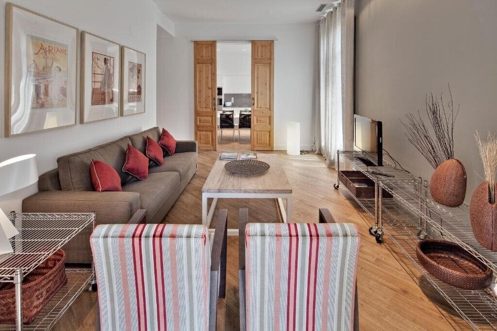 Фото Habitat Apartments Rambla Deluxe 4*