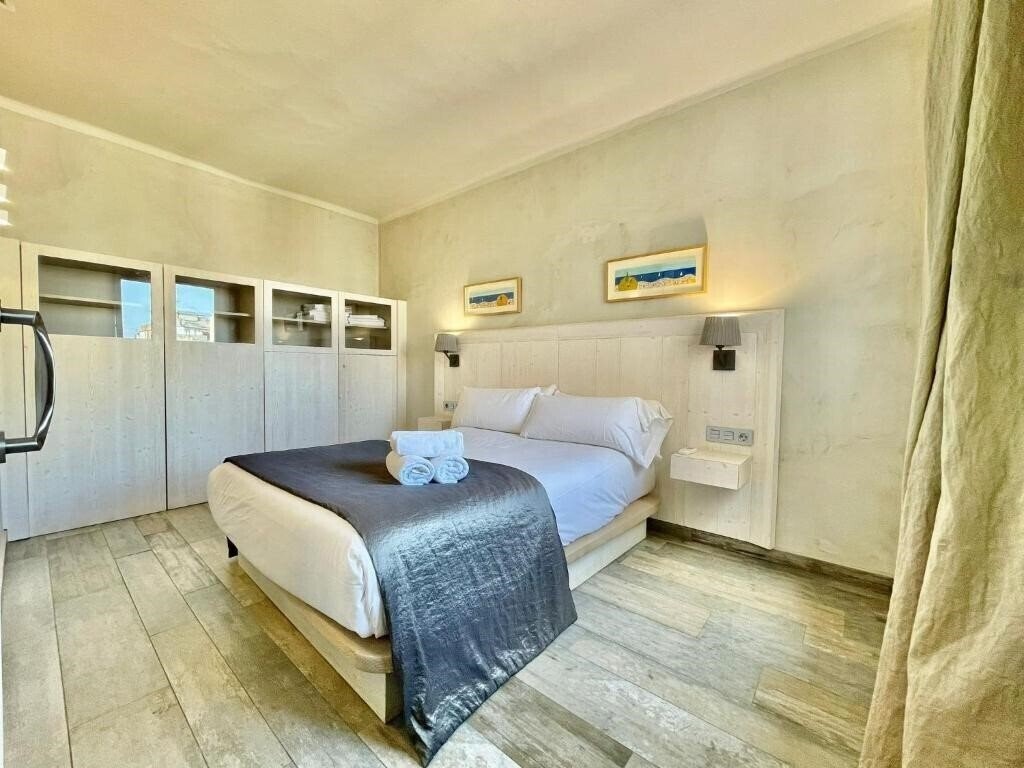 Фото BarcelonaForRent Market Suites 3*