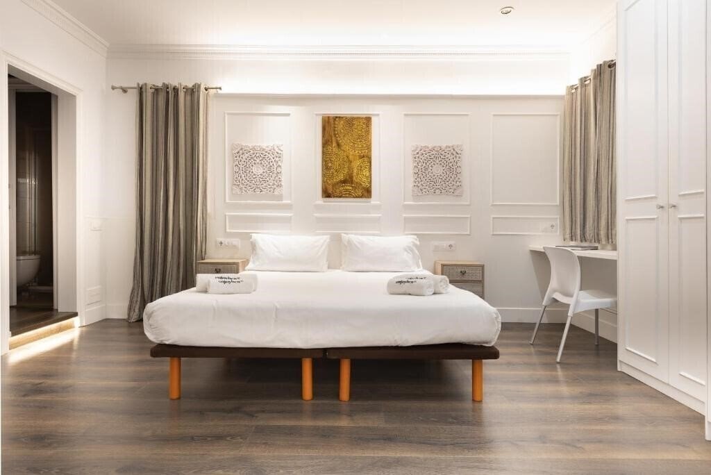 Фото Enjoybcn Coliseum Apartments 4*