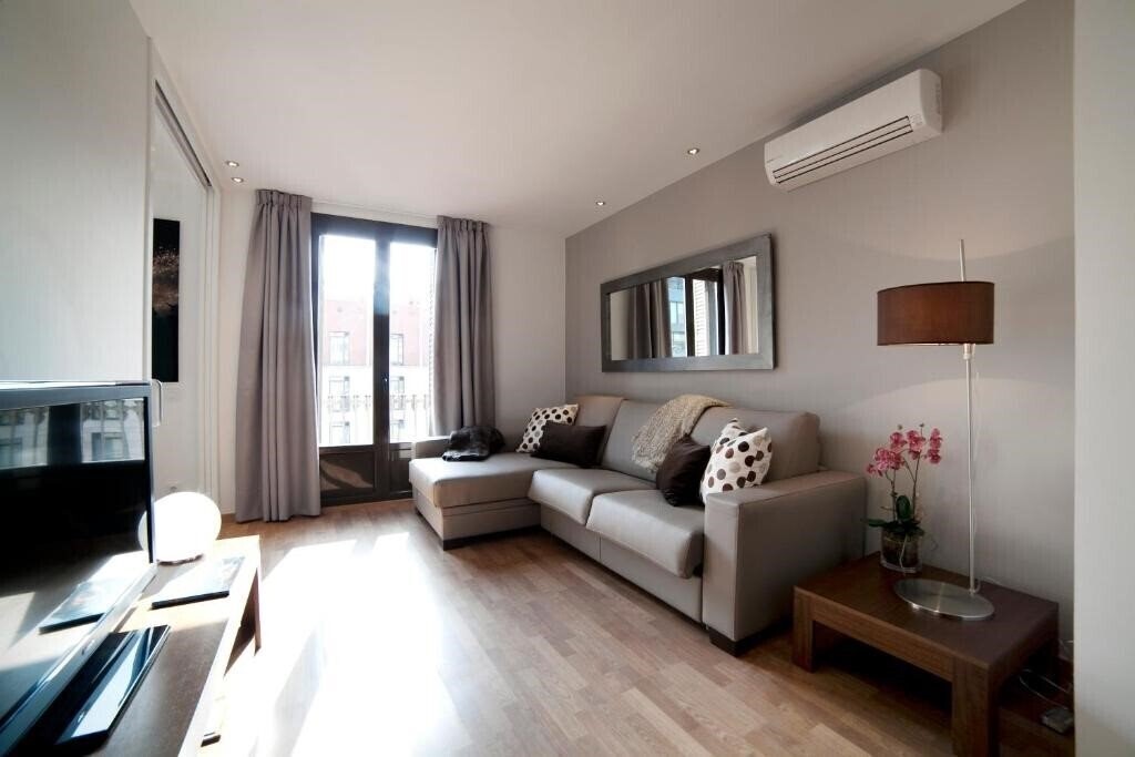 Фото Serennia Apartamentos Ramblas Placa Catalunya 3*