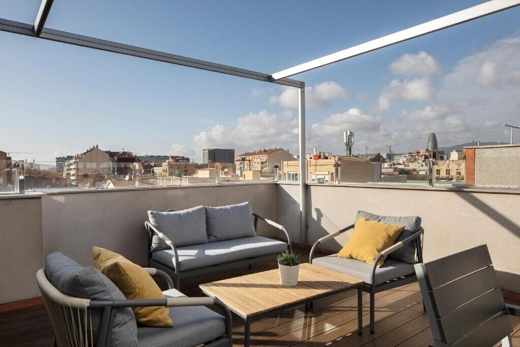 Отель Feelathome Poblenou Beach Apartments 4*
