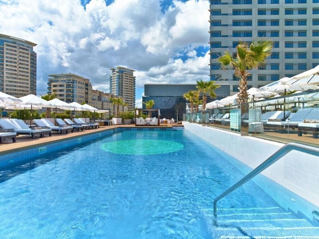 Фото Hilton Diagonal Mar Barcelona 4*