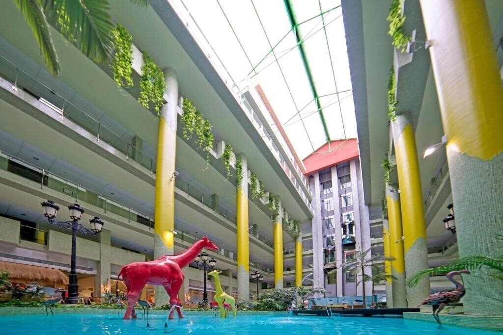 Фотографія Holiday World Riwo Hotel 4*