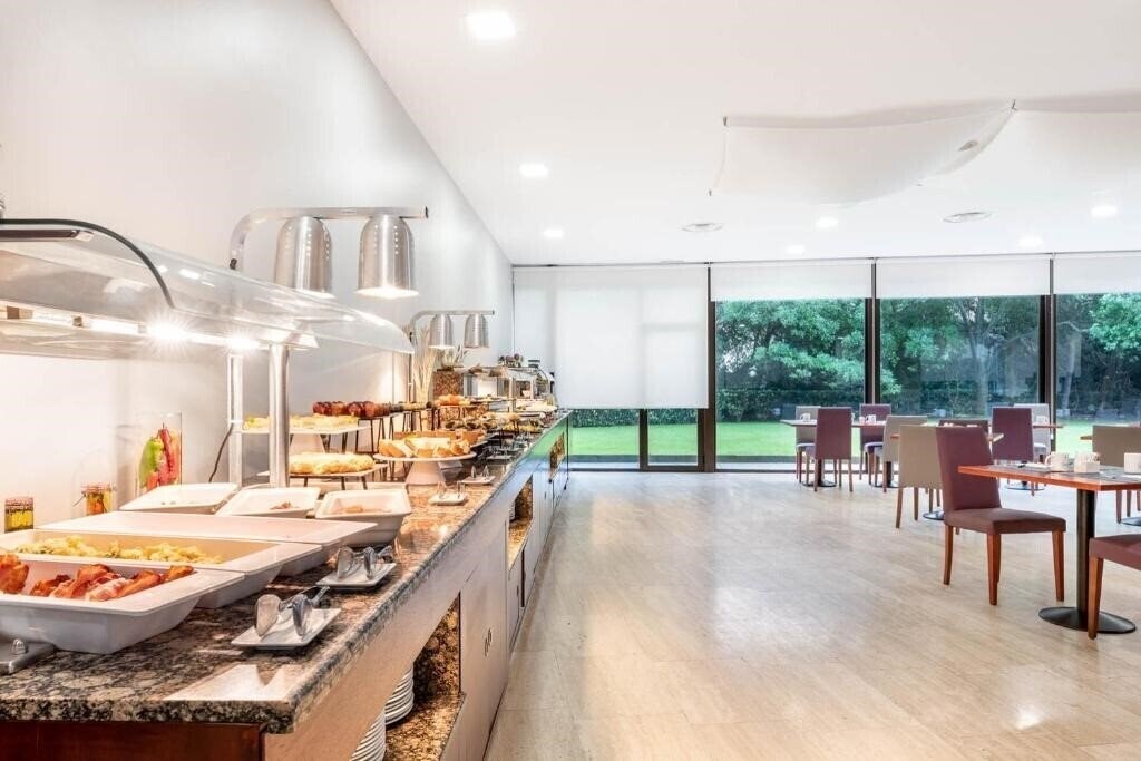 Фотографія Eurostars Ciudad De La Coruna 4*