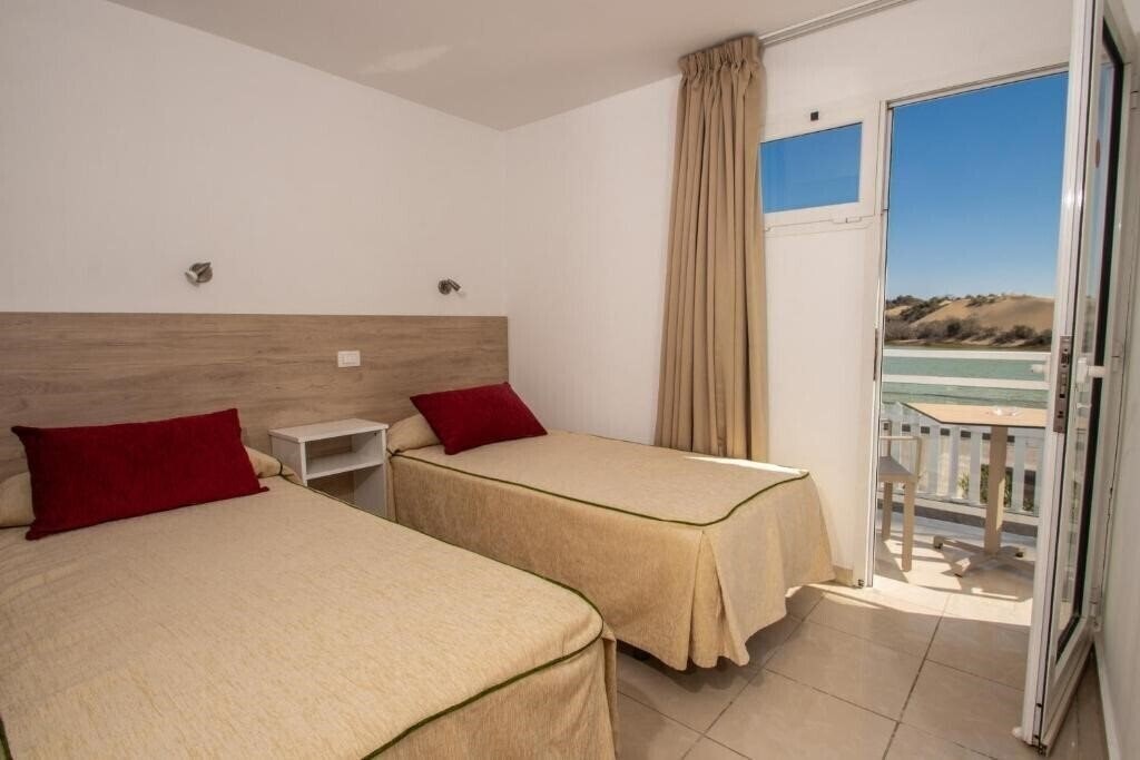 Фото Apartamentos Cocoteros 2*