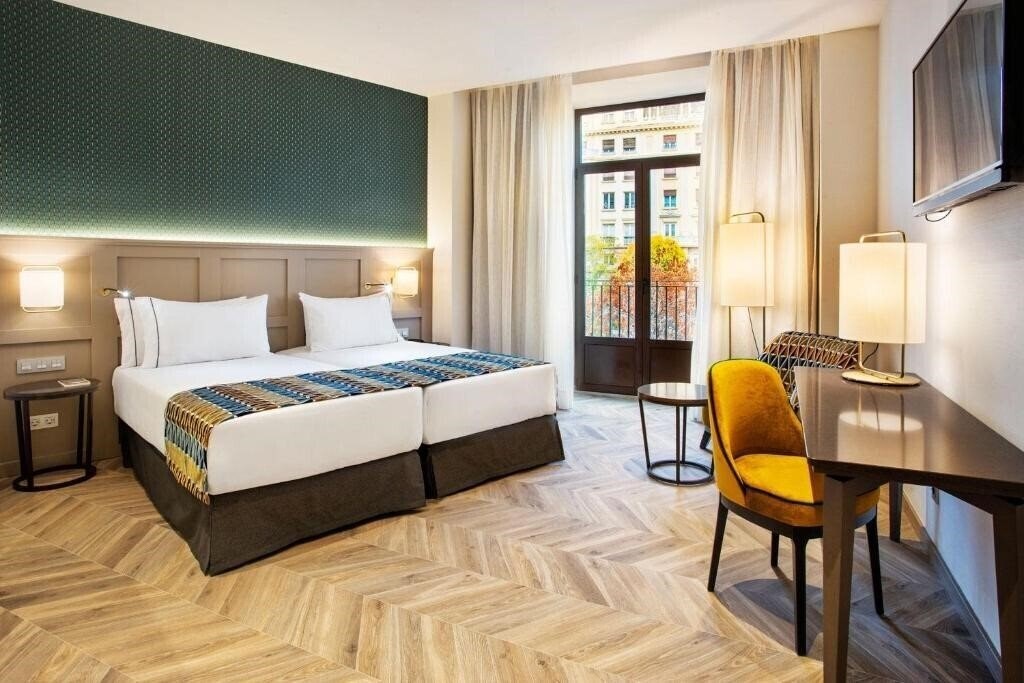 Фото Eurostars Puerta Real Hotel 4*