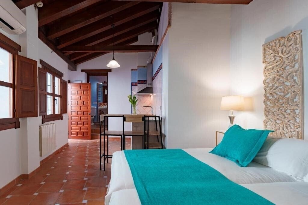 Фотографія Suites Casa De Las Columnas 3*