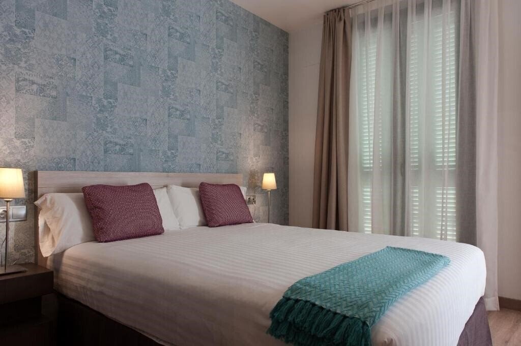 Фото Mh Apartments Sagrada Familia 4*