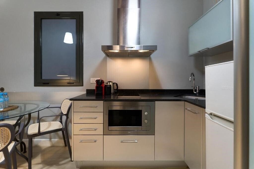Зображення Fira Apartments by gaiarooms 3*