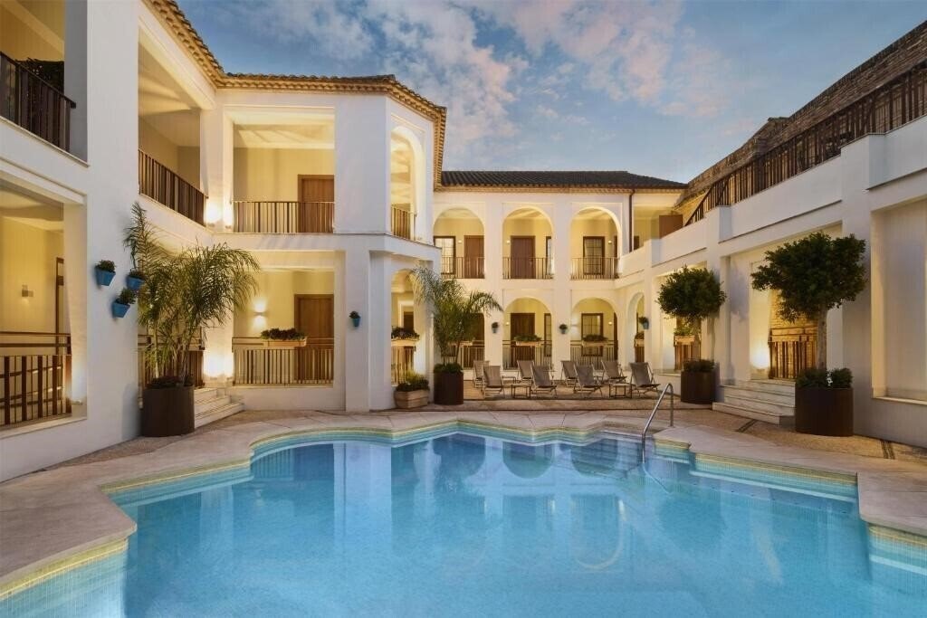 Отель Nh Collection Amistad Cordoba Hotel 4*