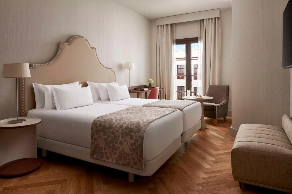 Фотографія Nh Collection Amistad Cordoba Hotel 4*
