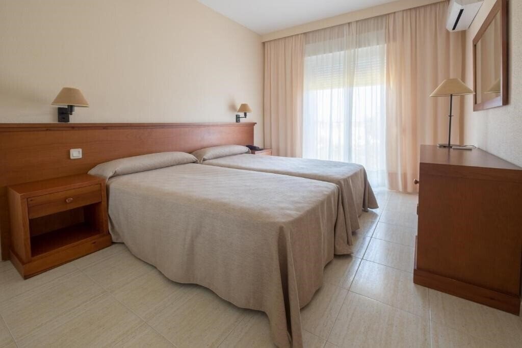 Фото Aparthotel Las Dunas 4*