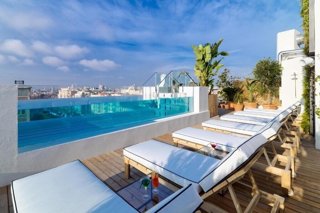 Фото H10 Puerta de Alcala 4*