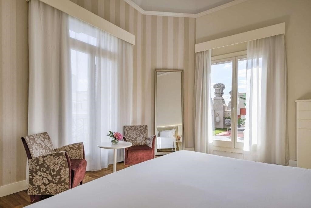 Фотографія NH Collection Madrid Abascal 4*