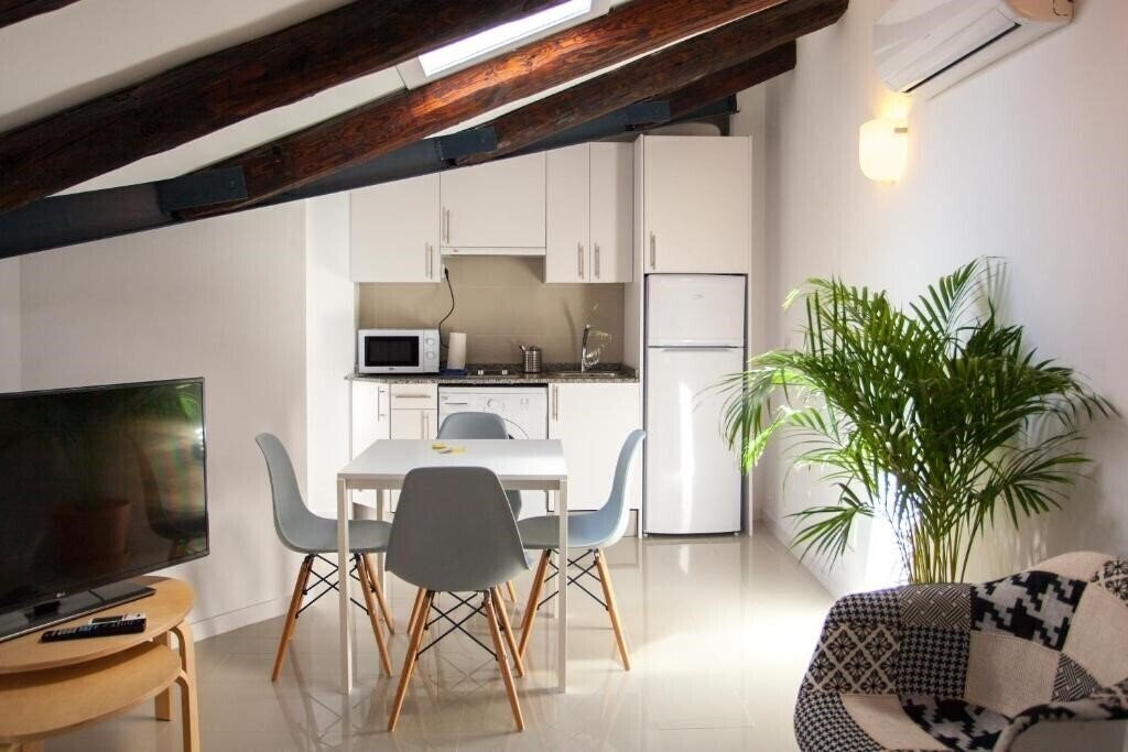 Фотографія Malasana Central Suites 3*