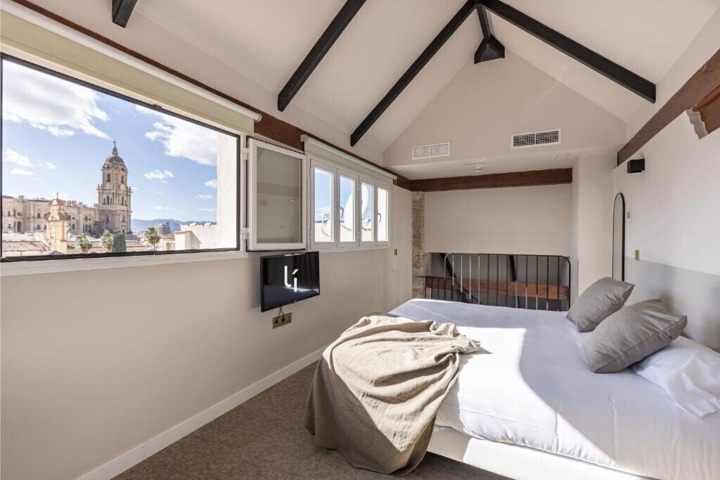 Готель Apartamentos Libere Malaga Teatro Romano 4*