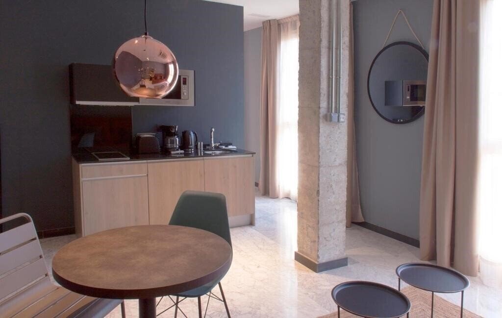 Фотографія Apartamentos NONO by Charming Stay 3*
