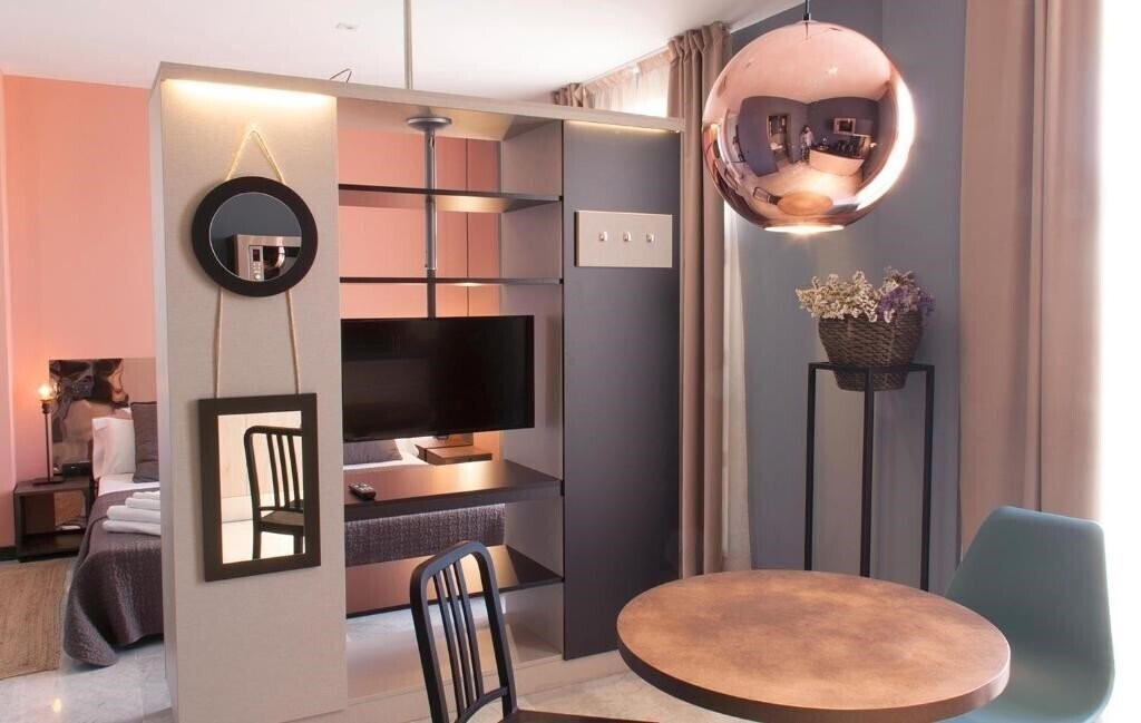 Фотографія Apartamentos NONO by Charming Stay 3*