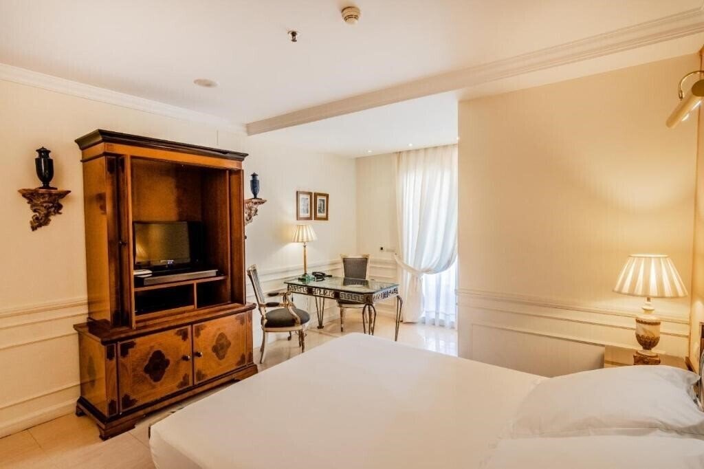 Изображение Apartamentos Guadalpin Suites 3*