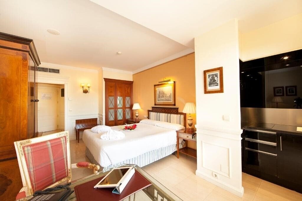 Отель Guadalpin Boutique Apartments 4*