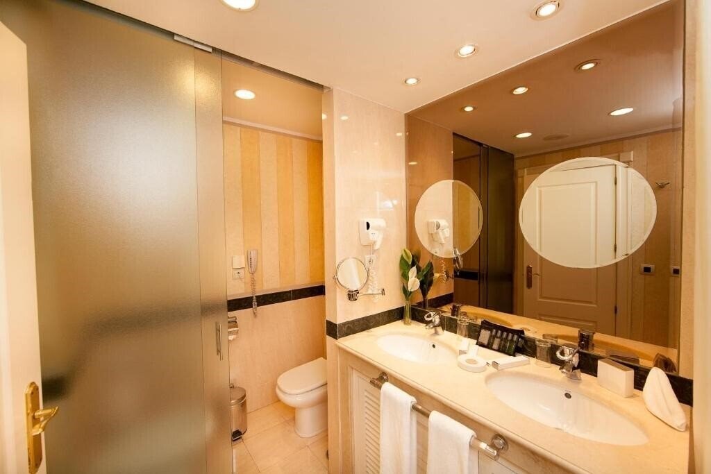 Фото Guadalpin Boutique Apartments 4*