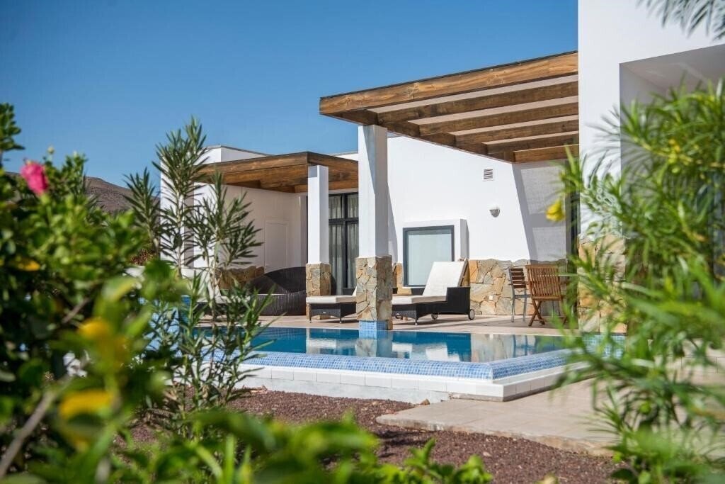 Фото Playitas Villas 4*