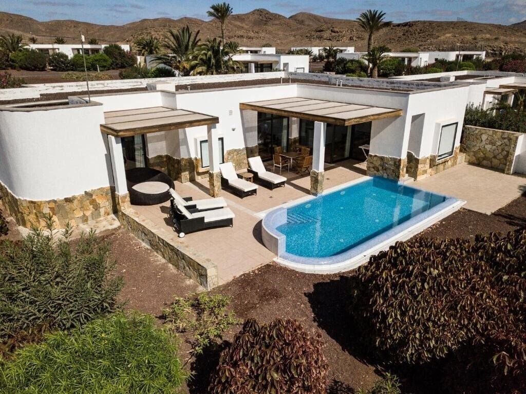 Фотографія Playitas Villas 4*