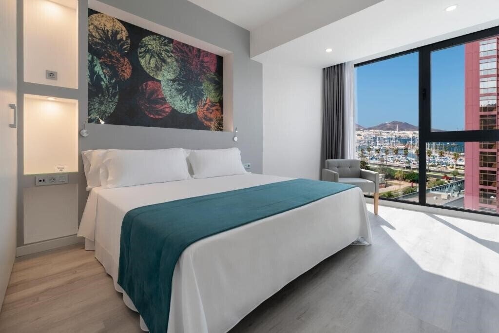 Отель Occidental Las Palmas 4*