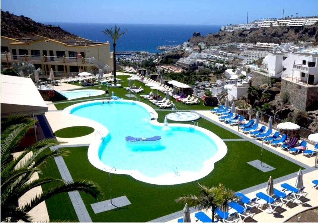 Отель Natural Park Apartments 3*
