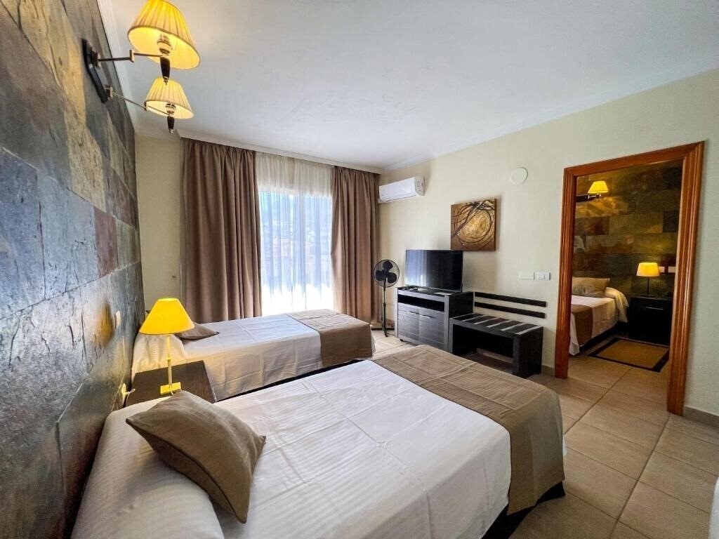 Фотография La Aldea Suites 4*