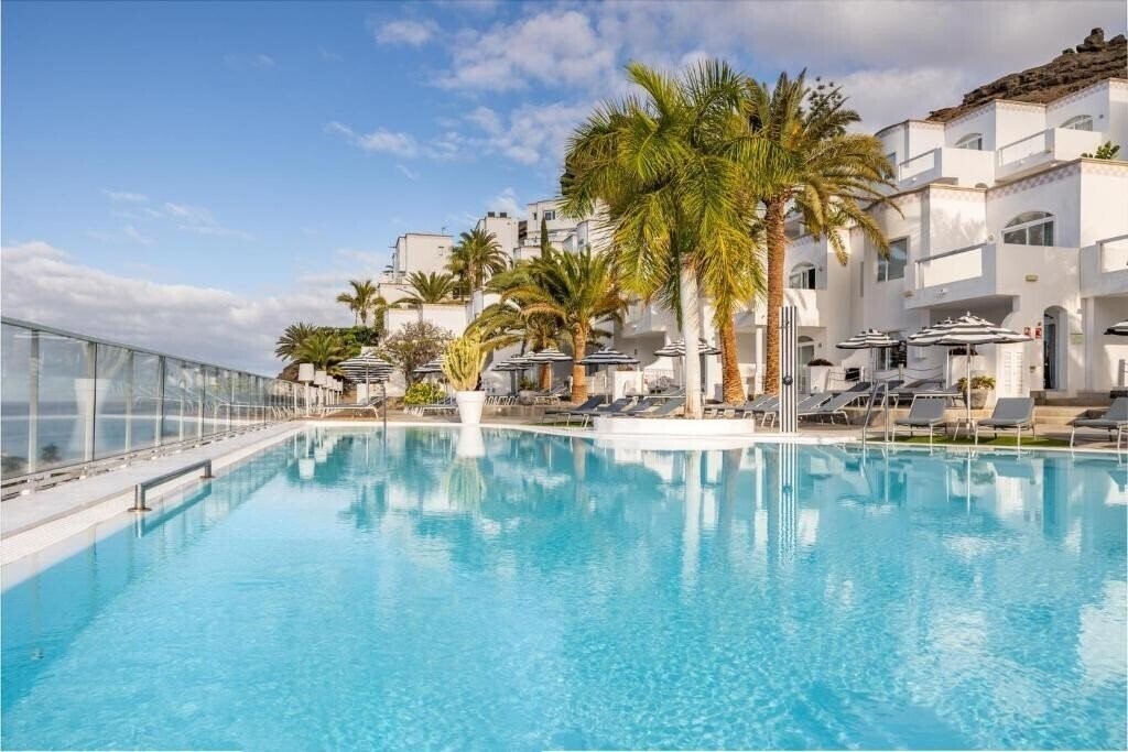 Отель Marina Bayview Apartments 4*