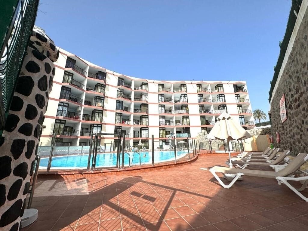 Отель Guinea Apartments 2*
