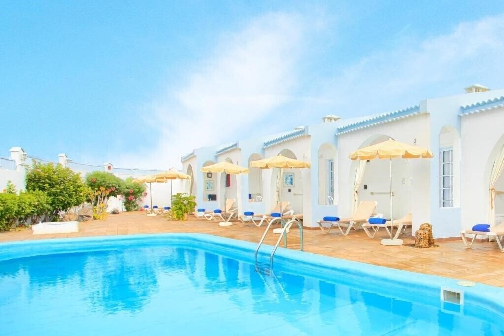 Отель Neptuno Bungalows 4*