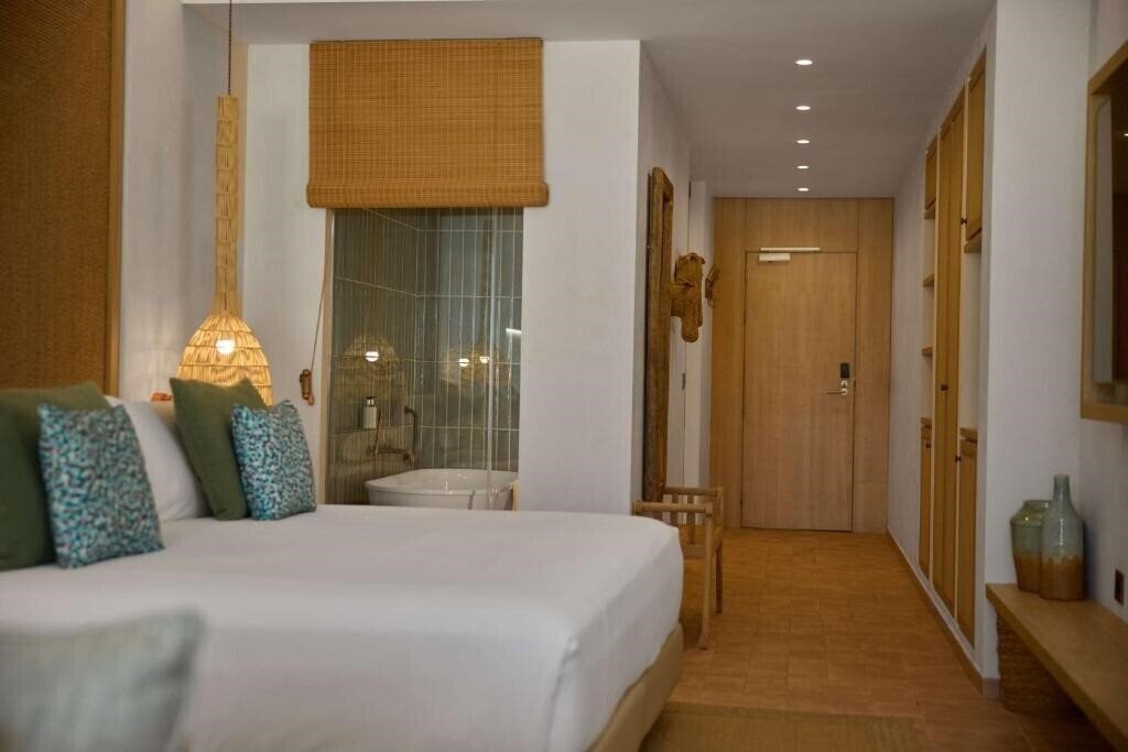 Картинка The Club Cala San Miguel Hotel Ibiza, Curio Collection by Hilton 5*