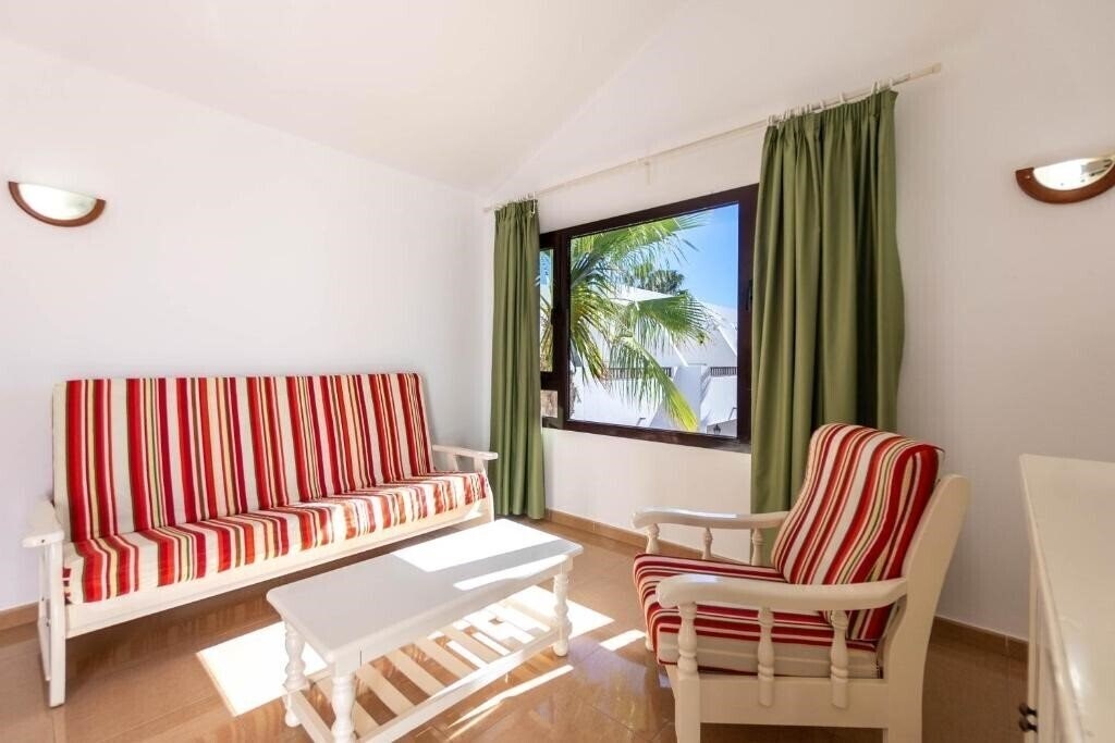 Фото Flamingo Apartments (Puerto Del Carmen) 3*