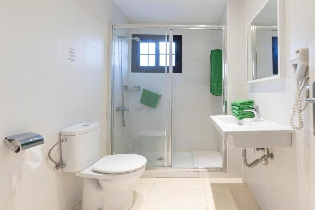 Фотографія Flamingo Apartments (Puerto Del Carmen) 3*