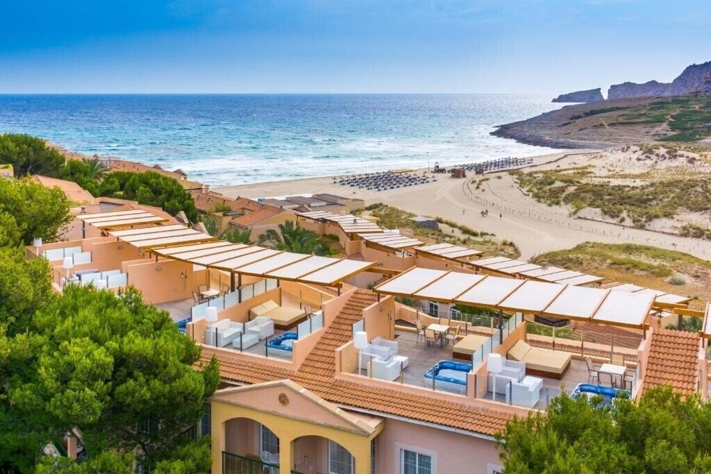Отель Zafiro Cala Mesquida 4*