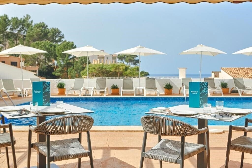 Отель Universal Aparthotel Don Camilo 4*