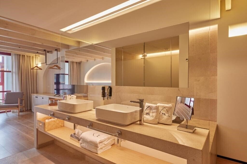 Фотография Apartahotel Fil Suites 4*