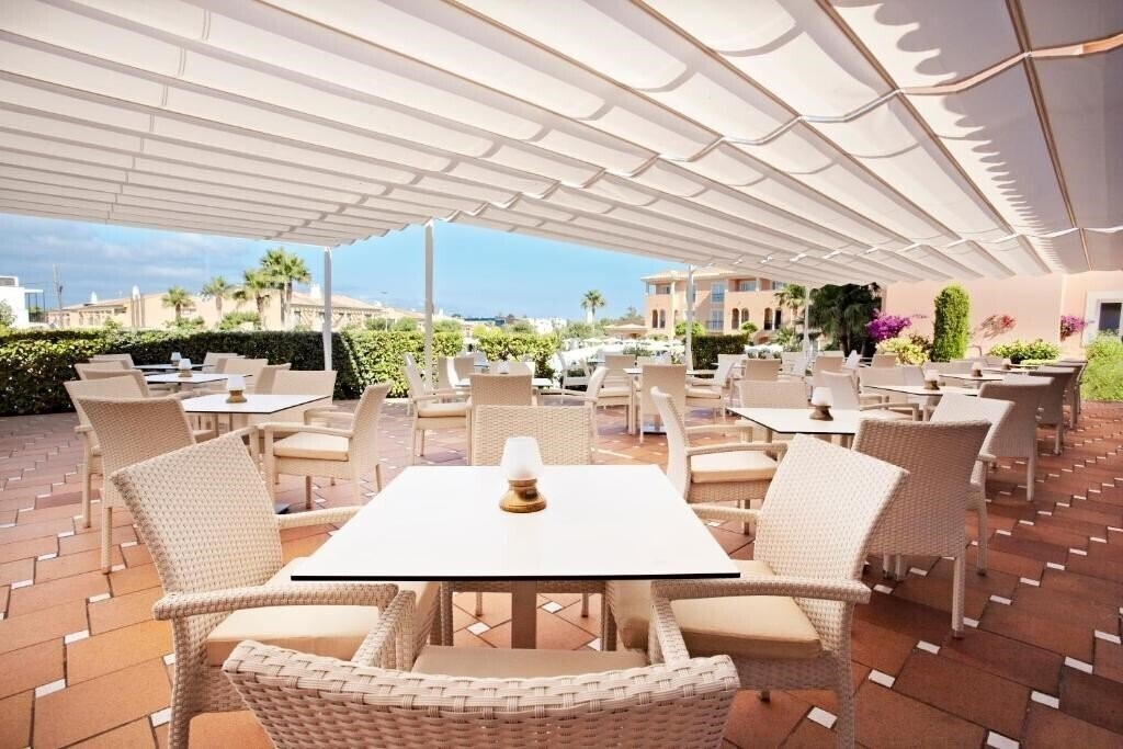 Фотографія Grupotel Macarella Suites & SPA 4*