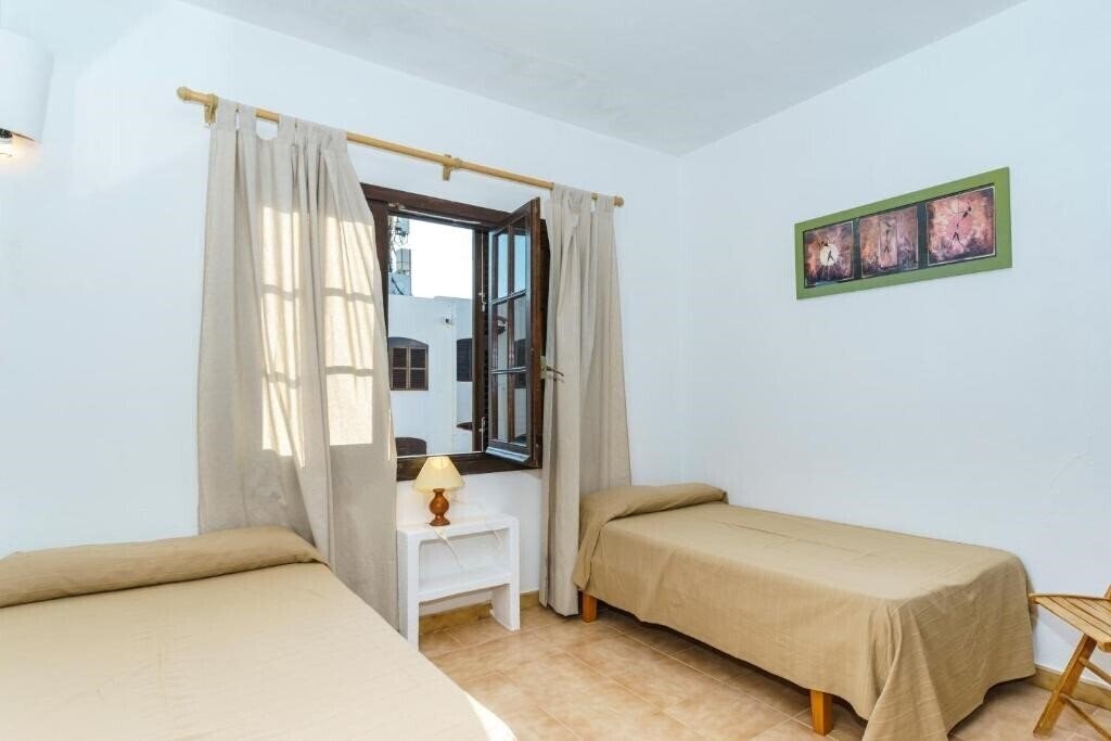 Фото Apartamentos Posidonia 4*