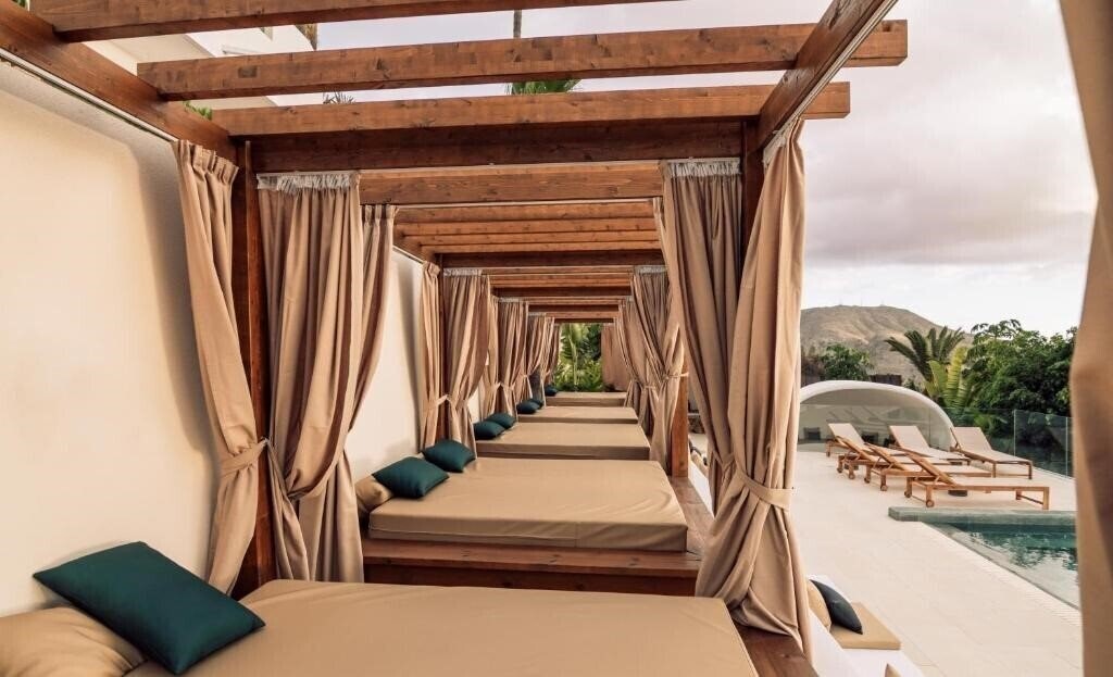 Фотографія Estefania Boutique Suites 4*