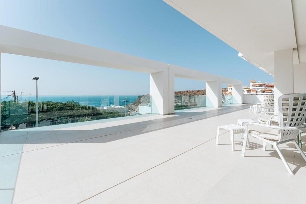 Фотографія Caleta Suites Tenerife 4*