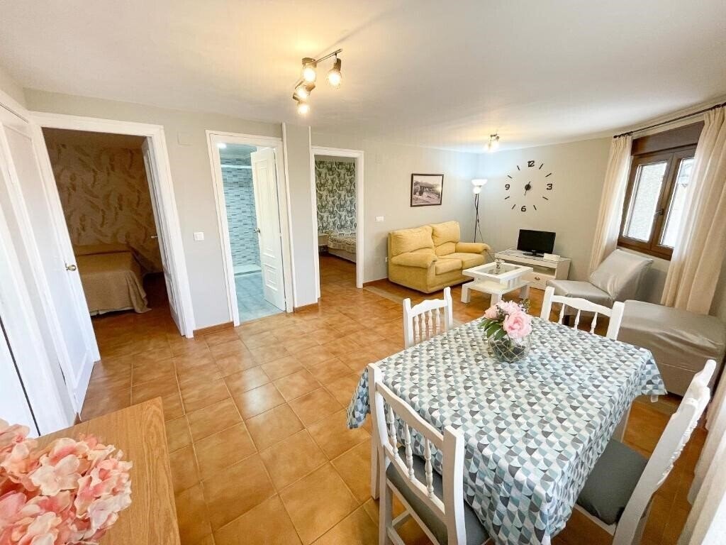 Фотографія Apartamentos Portonovo Playa 3000 3*