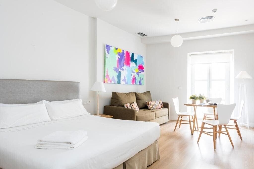 Фото Suites Sevilla Plaza 3*