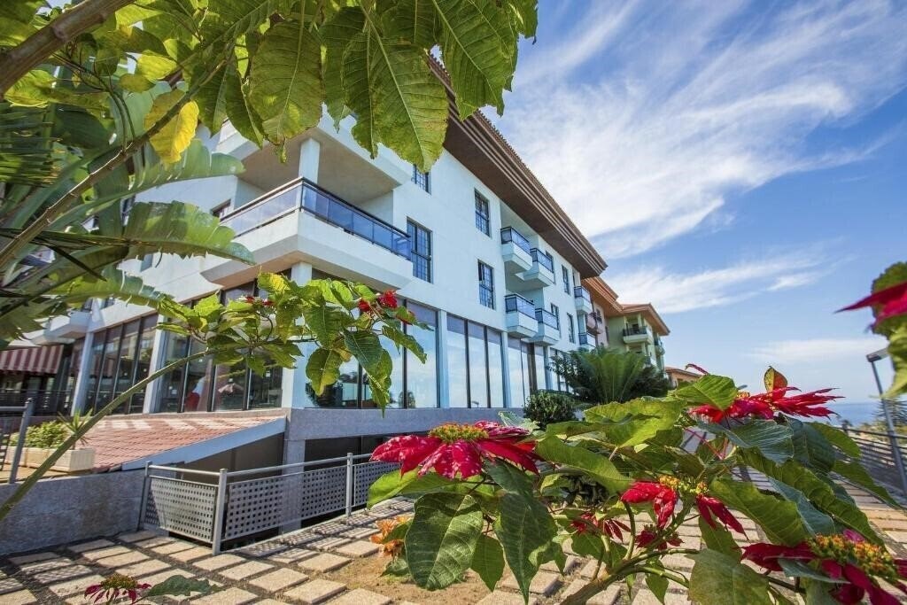 Фотографія Diamante Suites 4*