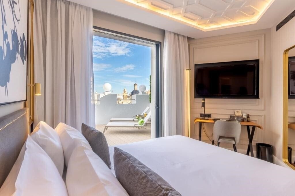 Отель L&H Gran Via Valencia 4*
