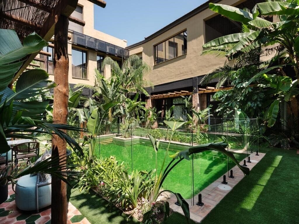 Фотографія Saman Hotel Boutique 4*