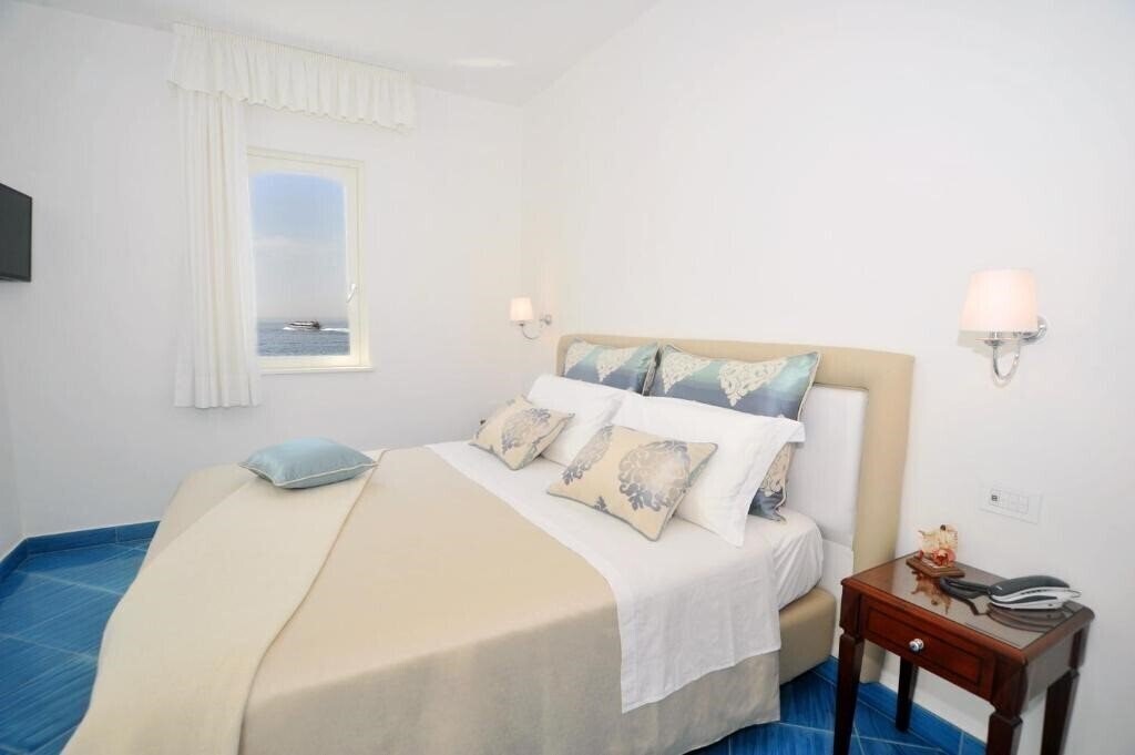 Готель Core Amalfitano City Suites 5*